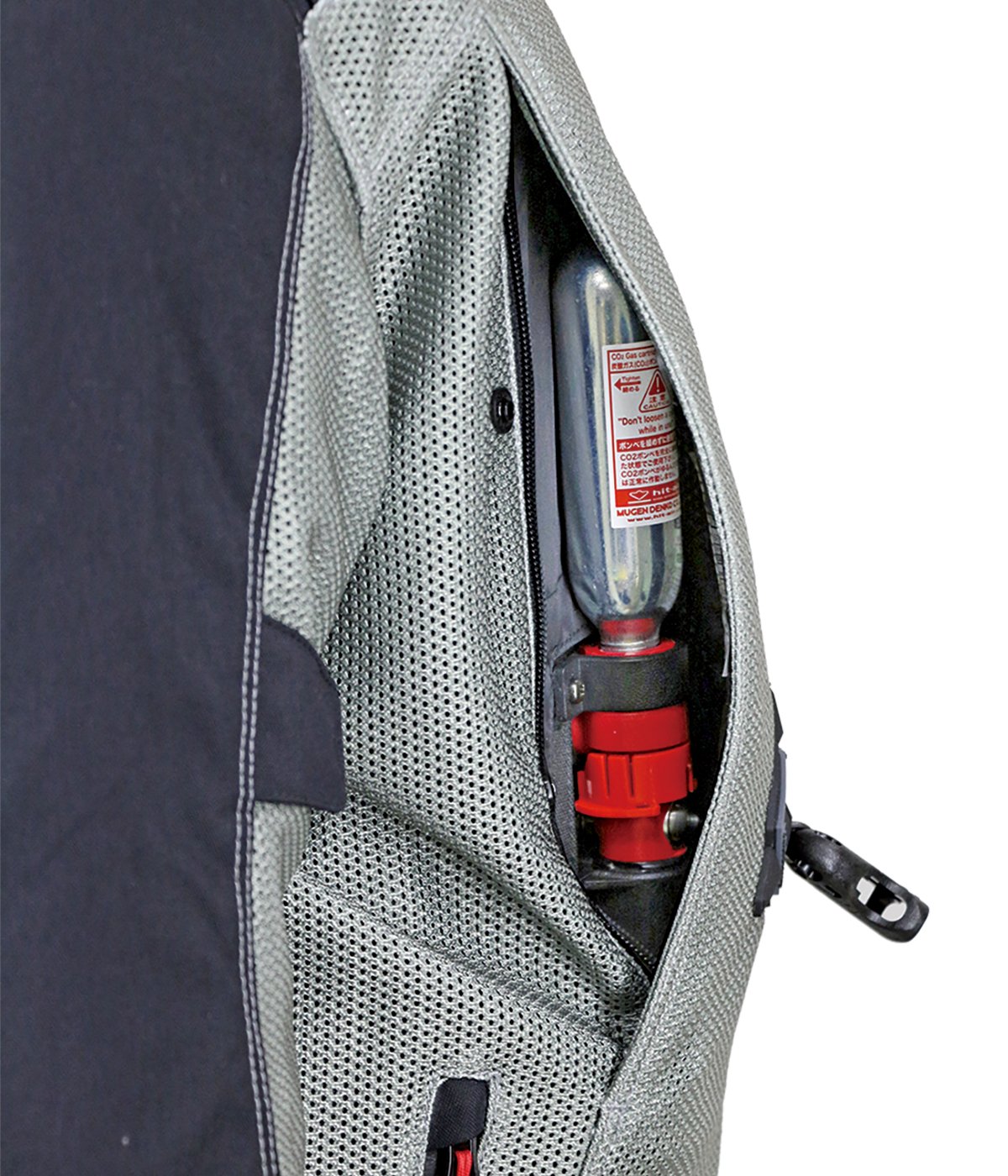 Caja de llave (Key Box): aloja el cartucho de CO2 de 50cc y activa el airbag al desconectarse el cable en espiral de la moto.