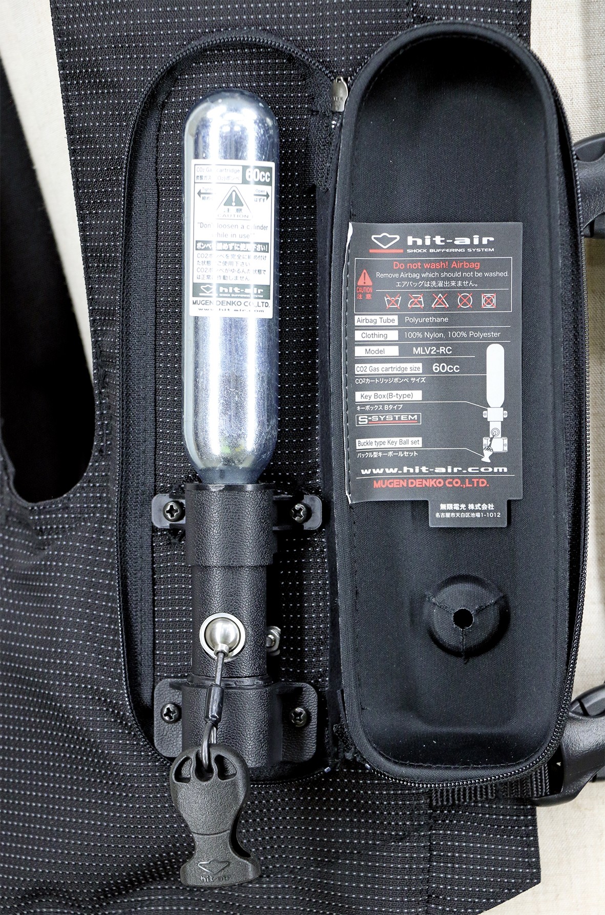 Caja de llave (Key Box): dispositivo que activa el airbag y aloja el cartucho de CO2. La tapa moldeada amortigua el impacto sobre el cartucho.
